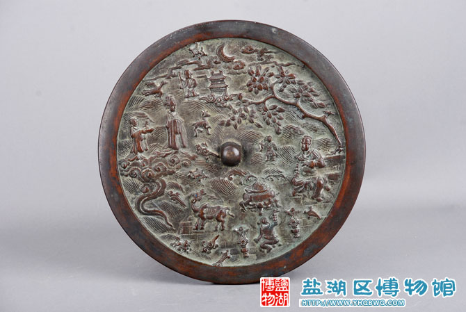 金海水人物云纹铜镜